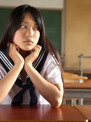 Tomoe Asian babe in uniform is happy in her way to school classes