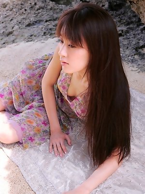 Long haired gravure idol with soft subtle boobs at the beach